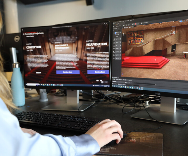 Student working on monitors. The student is working on a concept for an Ottawa museum. 