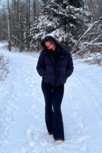 Student in the winter on a winter path