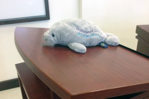Humanities mascot (Hugh the Manatee)