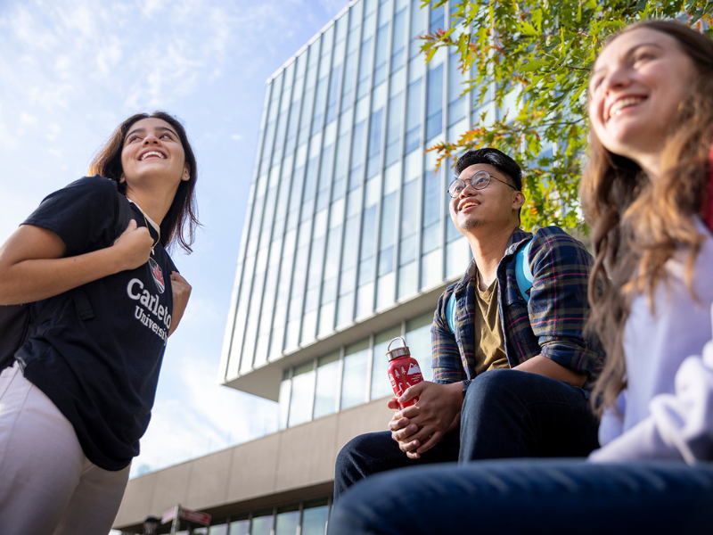 Three students outside of Richcraft Hall.