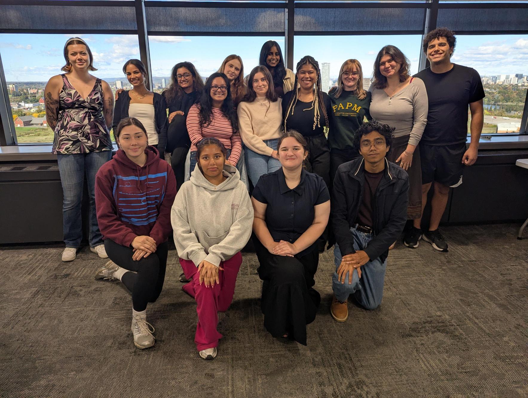 students in front of window