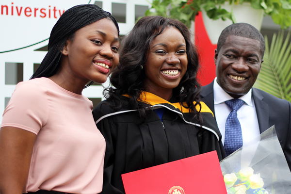 A family at convocation in 2017