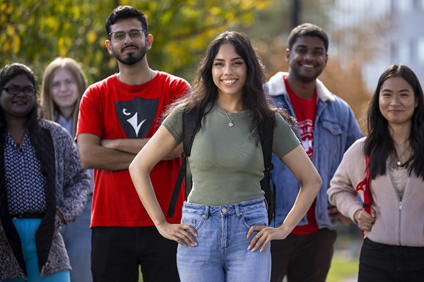 Group of students standing in a line, facing the camera.